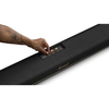 Marshall soundbar with a hand adjusting settings on a white background